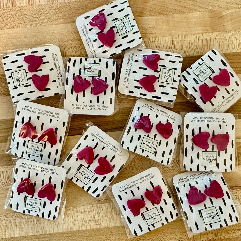 12 pink heart earrings.